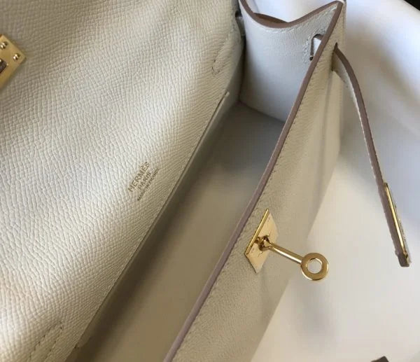 Herm猫s Kelly Pochette Mini Bag White