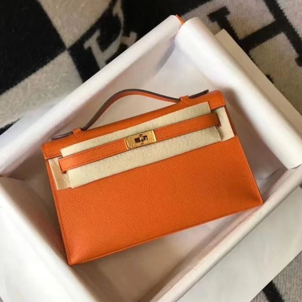 Herm猫s Kelly Pochette Mini Bag Orange