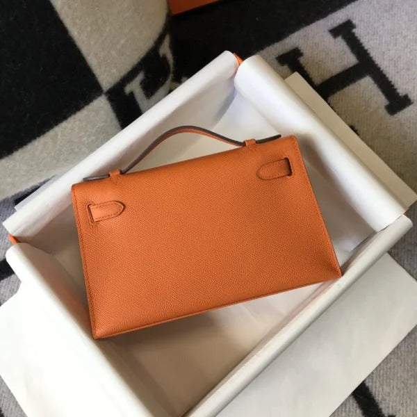 Herm猫s Kelly Pochette Mini Bag Orange