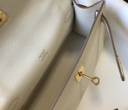 Herm猫s Kelly Pochette Mini Bag Brown