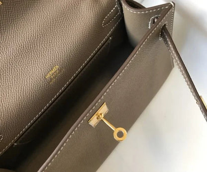 Herm猫s Kelly Pochette Mini Bag Brown
