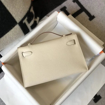 Herm猫s Kelly Pochette Mini Bag White
